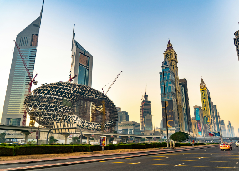 View of the Museum of the Future and Emirates Towers along Sheikh Zayed Road in Dubai, surrounded by luxury hotels and skyscrapers